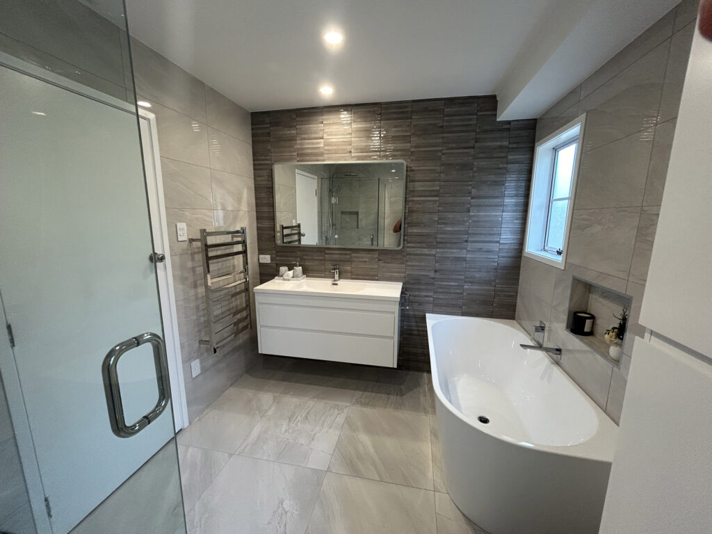 modern, stylish bathrooom renovation with floating vanity